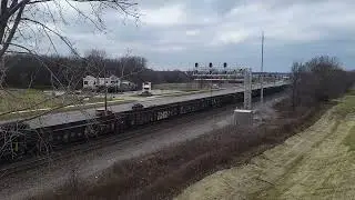 an eastbound Grandola train passing under the Cr 17 bridge in Goshen