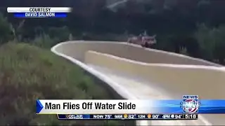 Video shows man flying off water slide