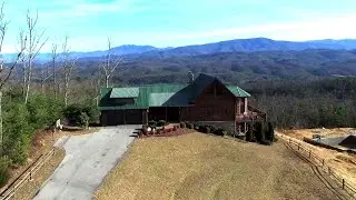 Custom log cabin in The Summit at 3065 Smoky Bluff Trl