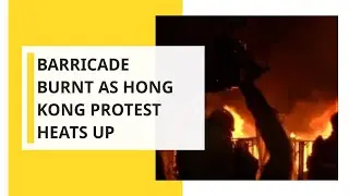 Barricade burnt as Hong Kong protest heats up