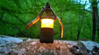 Camping in a survival shelter; building a secret shelter under a tree