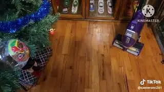 Practice cleaning Santa's footprints with shark rocket zero M and bissell powerforce Compact 