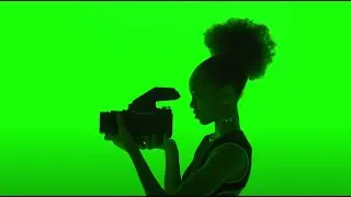 Girl shooting with camera green screen free stock footage overlay
