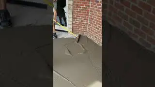 Gauge raking stamped concrete overlay