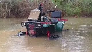 3/11/16 Lifted Polaris Magnum In Flooded Backyard