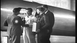 Amelia Earhart Putnam and associates load the Lockheed Electra with items needed ...HD Stock Footage