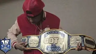RUM NITTY RECEIVES HIS CHAMPION OF THE YEAR BELT FROM JAY BLAC