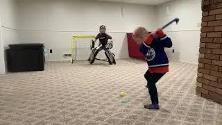 Amazing knee hockey mini stick goals from a 4 year old!