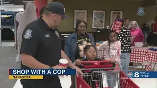 125 Sarasota children 'shop with a cop' for free presents