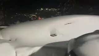 Showing a completely buried car covered in Snow @ Beech Mountain, NC 1/23