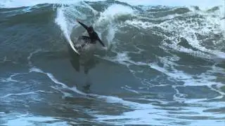 Surf en el puerto de Zarautz, en Cracks del Surf