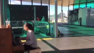 Public piano playing Panmure Station 02