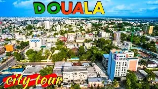 Drive through the administrative neighborhood of Douala Cameroon Bonanjo