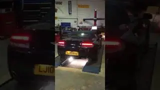 Aston Martin V8 Vantage in for wheel alignment. Revving and exhaust noise.