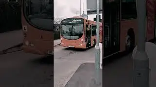 69381 HY09 AKG Volvo B7RLE first training bus arriving at red traffic light