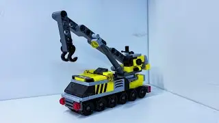 Assemble 142-piece mini crane model
