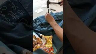 We're installing rivets into a handmade denim vest  #cowboy#handmadejacket#smallbusiness#handcrafted