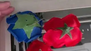 Three artificial flowers