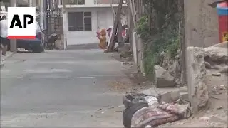 Peru officer convinces woman suspected of drug dealing out of her house by dressing as a care bear