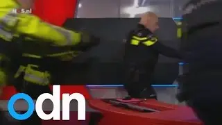 Dramatic video: Dutch police storm TV studio and arrest gunman