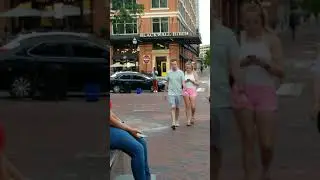 singing in the streets of Baltimore at the inner harbor