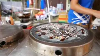 Saigon Street Food: Black Crepe With Oreo Cookies And Sprinkles