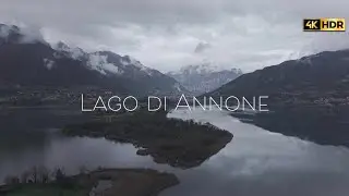 Lago di Annone - Serene Reflections: A Cloudy Lake View 4K