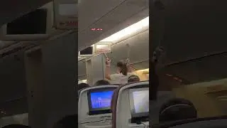 flight attendant put spray on the airplane (latam) Dreamliner