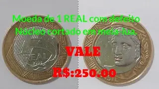 Moeda de 1 REAL com defeito            N&uacute;cleo cortado em meia-lua