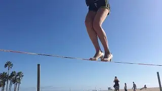 Fearless Woman Slacklines In Heels