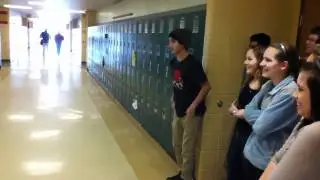 Kid Does Backflip in School Hallway