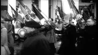 French colonial military veterans, holding flags, parade in the streets of Algier...HD Stock Footage