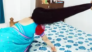 Indian beautiful wife with open long hair in traditional dress 