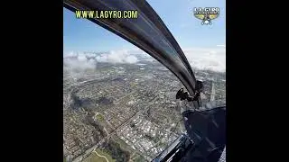 Kalithea gyroplane among the puffy clouds over Ventura, CA...