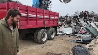 Hauling off scrap metal in a grain truck made into a junk haulin trailer. 