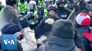 Scuffles in Ottawa as Police Push to Break Up Protests