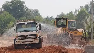 New Road Constructs by Professional Operation with Roller , Motor grander and Waterfall truck