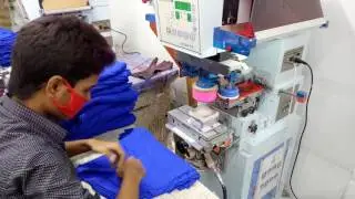 Garments printing with tagless pad printer