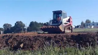 tekeuchi TL240 in action