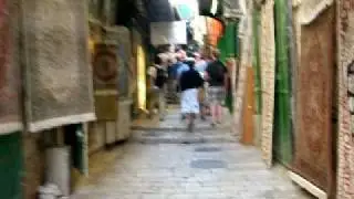 Walking down via DOLOROSA (path Jesus walked to his Crucifixion) in Jerusalum, Israel