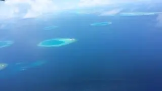 Seaplane flight over North Male (Kaafu) atoll 4k - no.2