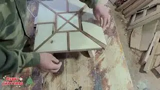 The carpenter in the countryside made a small table as a Christmas gift for his wife.
