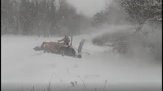 Lake Effect Snow: Massey Ferguson 1428v and AgroTrend 60