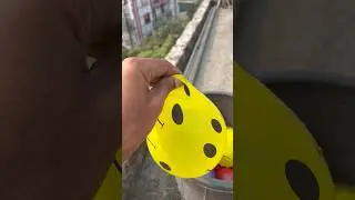 Experiment: Will a water balloon explode when it rolls down from a tall building?💥🎈#satisfying