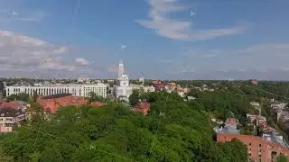 Aerial view of Kaunas city center on a sunny summer day, showing the architecture, greenery and