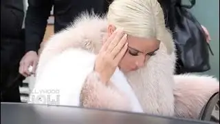 Kim Kardashian in sexy bondage dress