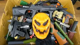 Halloween Special Pumpkin Mask, Toy Dozens of Guns And Rifles Arsenal, Dozens Of Pistols And Guns
