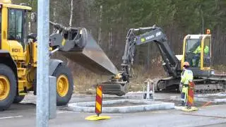 Volvo ECR88 Plus & L70G in work backfilling around a new street refuge
