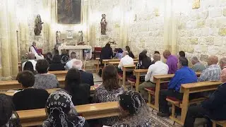 Christians, Muslims gather for special Mass in Jifna for victims of strike on a church