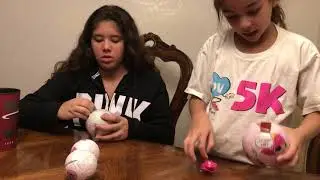 Opening a giant LOL surprise ball.